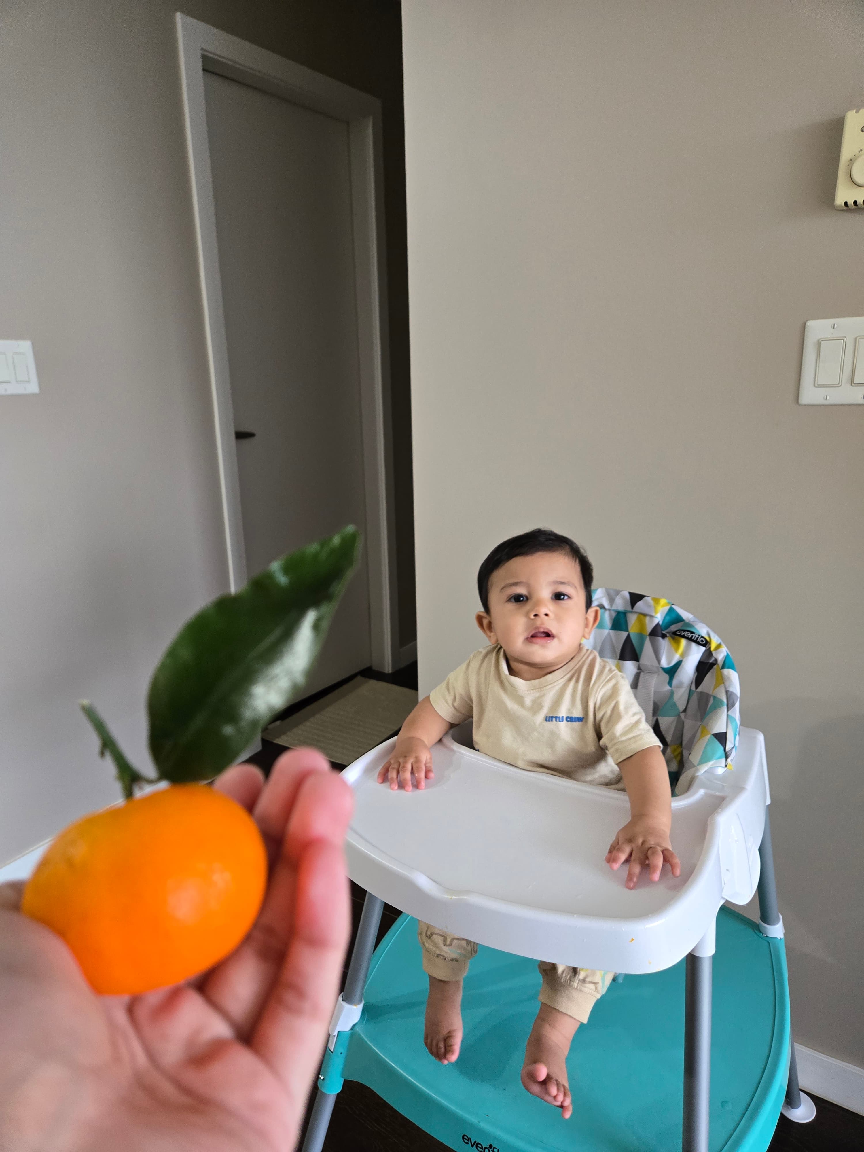 Salahaddin with an orange